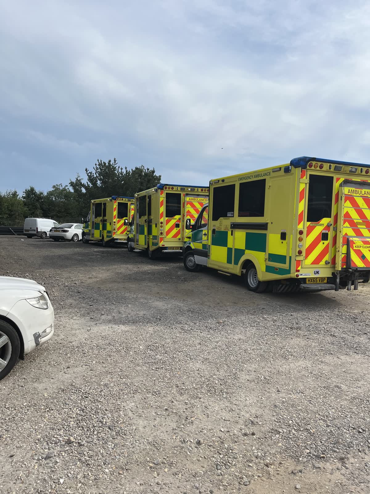 Convoy ambulances lined up on the yard ready to depart
