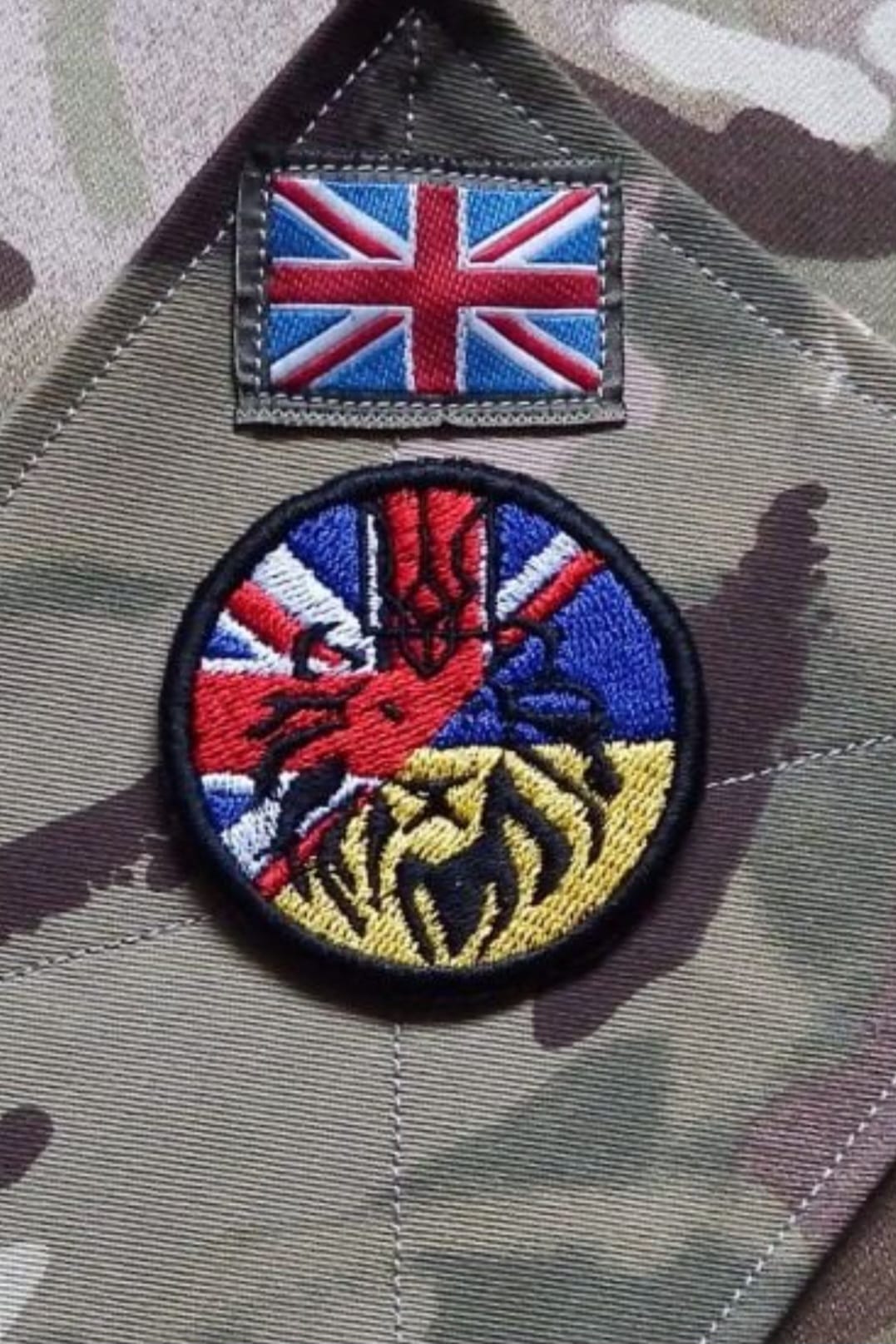 UK and Ukraine combined military patch on a soldier's uniform